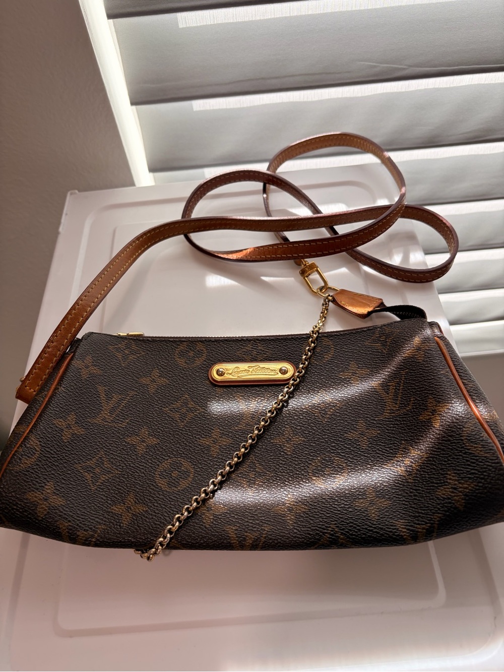Authentic Louis Vuitton Eva Monogram with strap